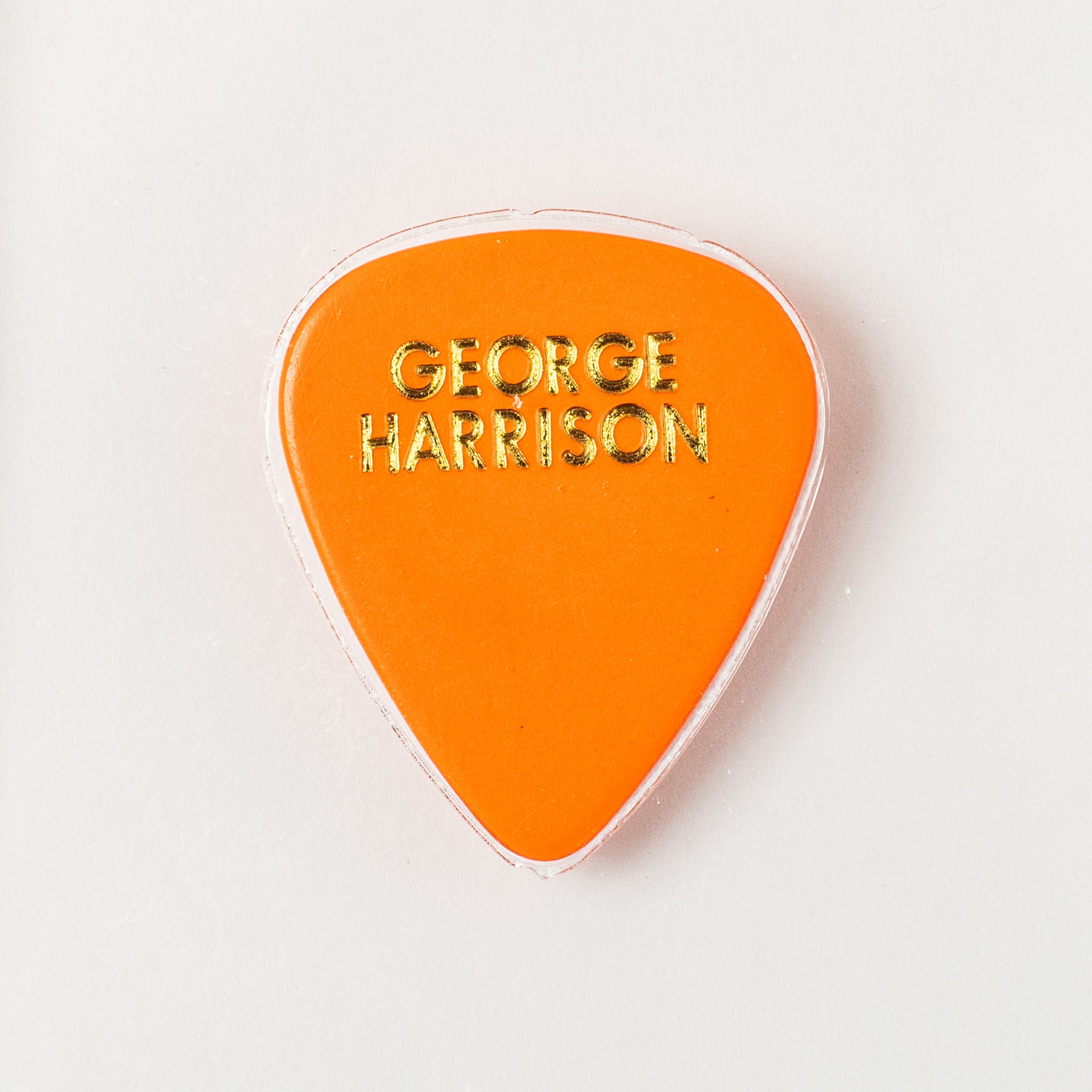 George Harrison Original Guitar Pick - Orange Color (AMG 50009916)